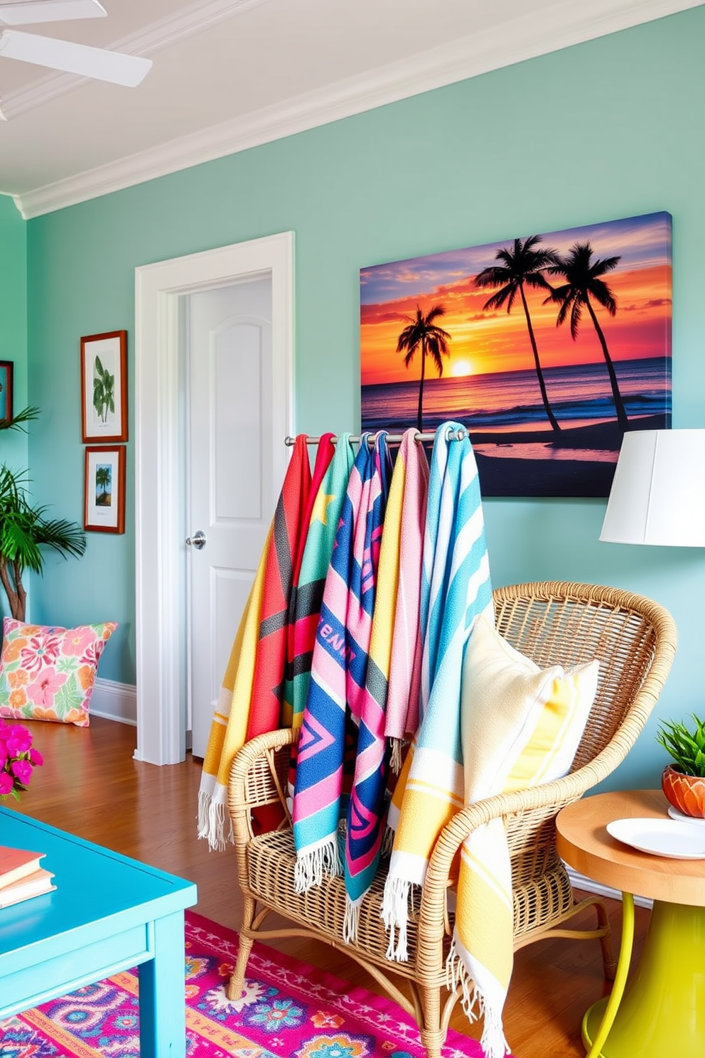 A vibrant living room filled with bright colors and beach-inspired decor. Colorful beach towels are artfully draped over a stylish wicker chair and hung on a decorative rack. The walls are painted in a soft aqua shade, reminiscent of the ocean. A large canvas featuring a tropical sunset adds warmth and a sense of relaxation to the space.