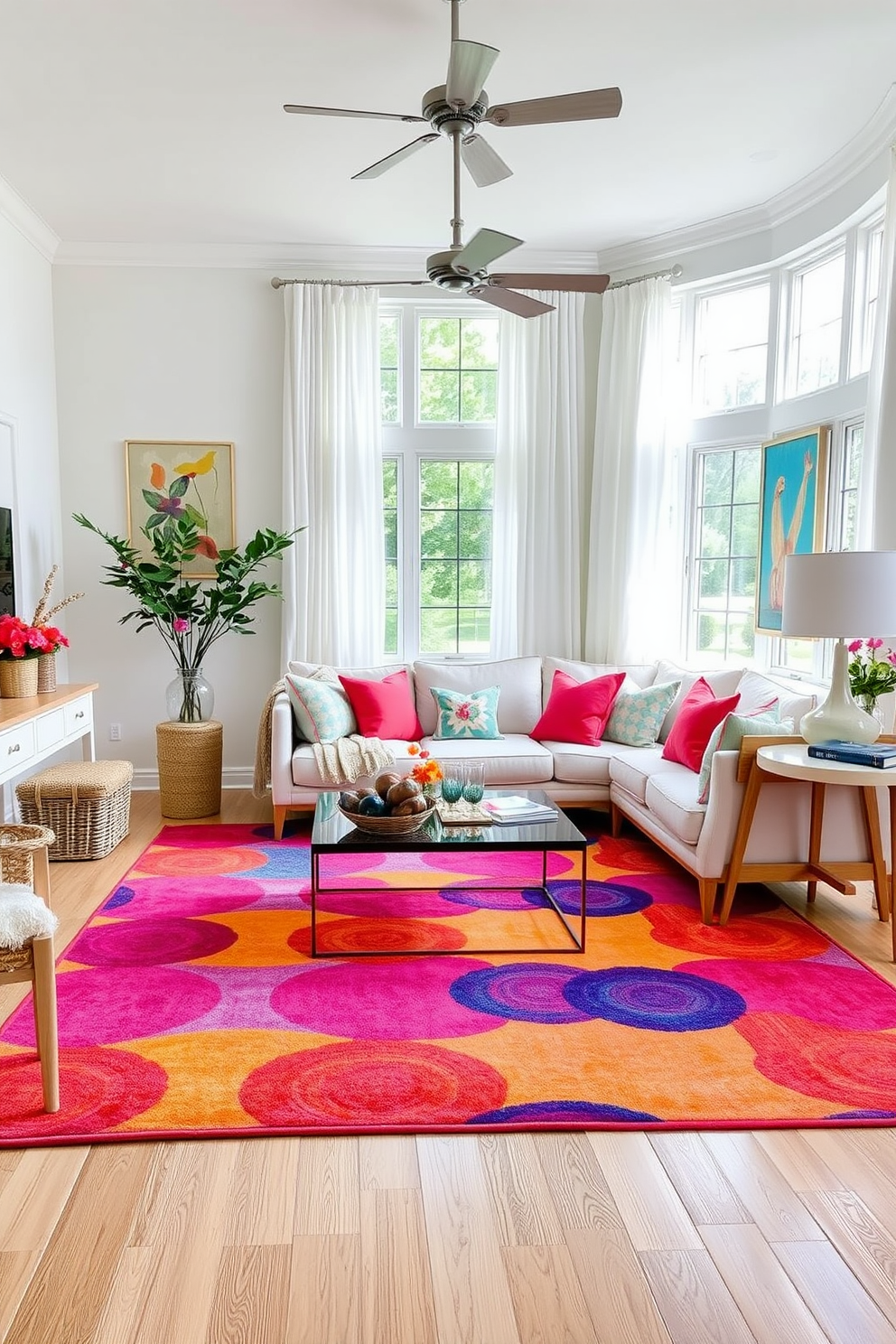 Create a vibrant living room that features a large, colorful area rug as the focal point. The rug should complement bright throw pillows on a neutral sofa and be surrounded by light wooden furniture. Incorporate fresh summer decor elements such as floral arrangements and bright artwork on the walls. Add natural light through large windows adorned with sheer white curtains to enhance the cheerful atmosphere.