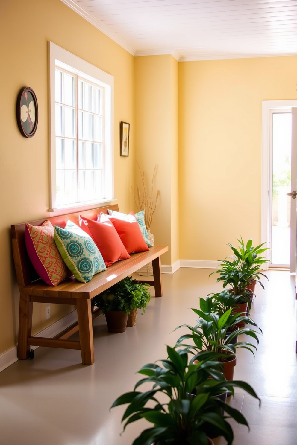 A bright and inviting hallway features a long wooden bench against the wall. The bench is adorned with vibrant throw pillows in various patterns and colors, adding a cheerful touch to the space. Natural light streams in through a nearby window, illuminating the hallway's warm tones. Potted plants are placed strategically along the floor, enhancing the summer vibe of the decor.