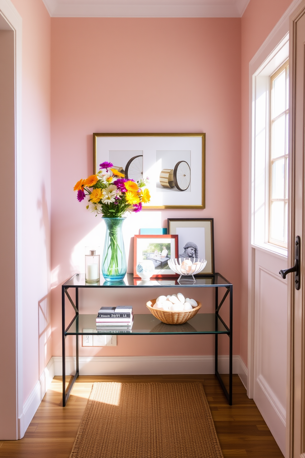 A stylish hallway features a sleek console table adorned with a collection of vibrant summer-themed decor. Fresh flowers in a colorful vase sit atop the table alongside framed art and a decorative bowl filled with seashells. The walls are painted in a soft pastel hue, creating a warm and inviting atmosphere. A woven runner adds texture to the space, while natural light streams in through a nearby window, illuminating the cheerful decor.