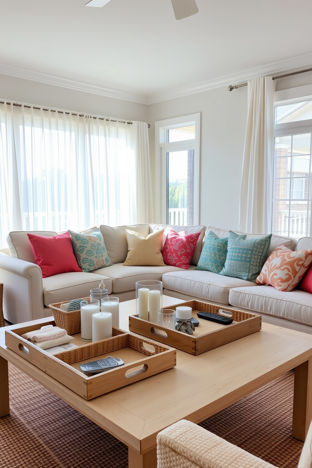 A stylish summer living room features decorative trays arranged on a coffee table to organize small items such as coasters, candles, and remote controls. The trays are made of natural materials like woven wicker and light-colored wood, enhancing the airy and relaxed atmosphere of the space. Bright throw pillows in vibrant colors and patterns are scattered across a comfortable sectional sofa, inviting relaxation. Large windows allow ample sunlight to flood the room, while sheer curtains flutter gently in the summer breeze, creating a cheerful and inviting ambiance.