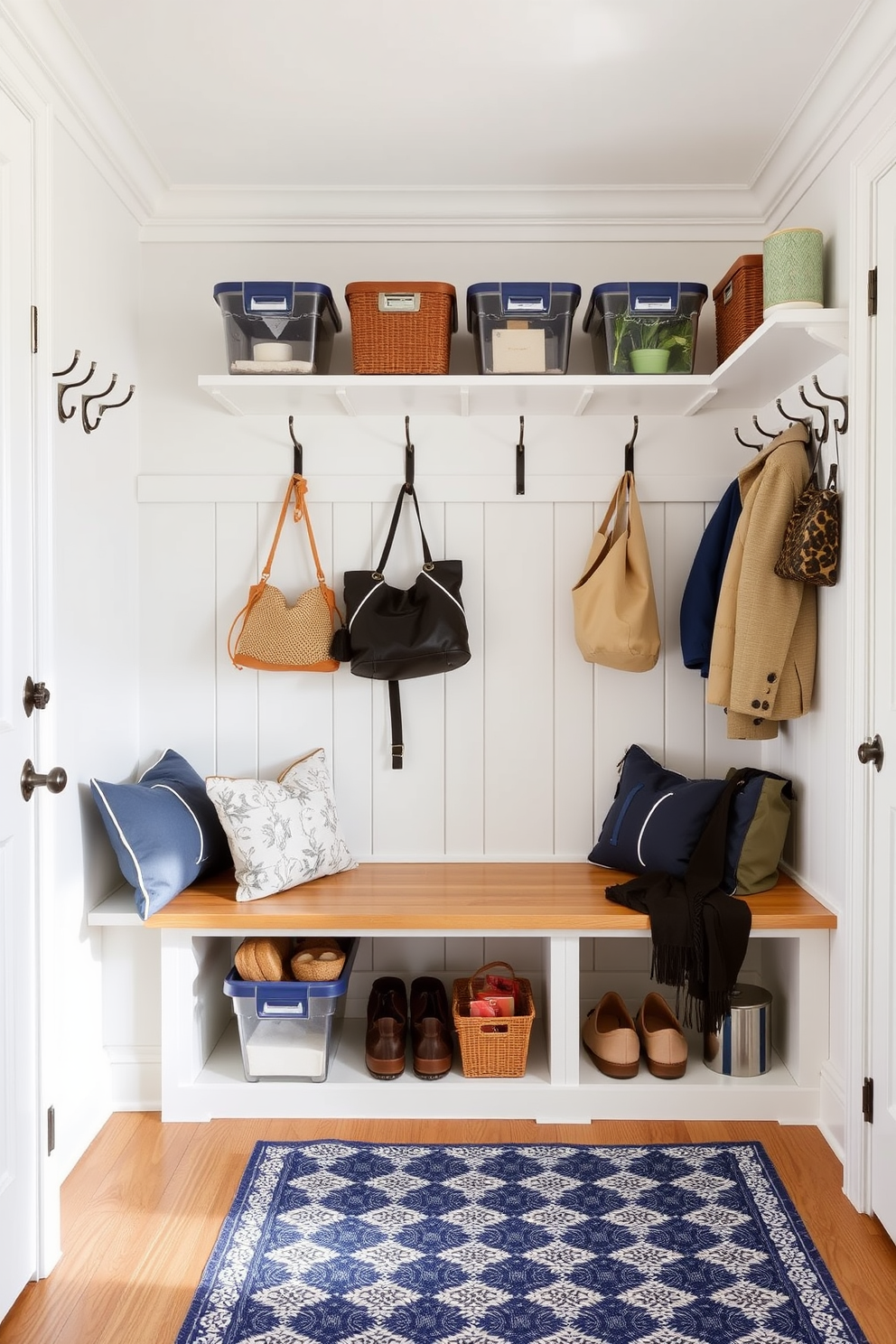 A bright and airy mudroom features clear containers for easy visibility and access to seasonal items. The walls are adorned with hooks for hanging bags and jackets, while a bench with built-in storage provides a practical seating area.