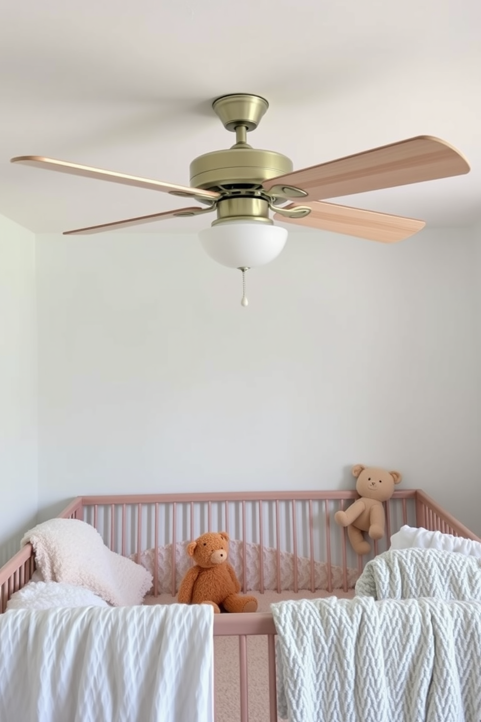 A serene nursery space designed for summer comfort. The room features a breezy ceiling fan with light wood blades, promoting airflow and keeping the space cool. Soft pastel colors adorn the walls, creating a calming atmosphere. Plush toys and cozy blankets are thoughtfully arranged, inviting relaxation and play.