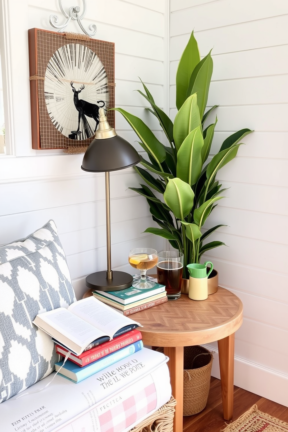 A cozy summer reading nook features a small side table perfect for holding drinks. The table is adorned with a stylish lamp and a stack of books, creating an inviting atmosphere for relaxation.