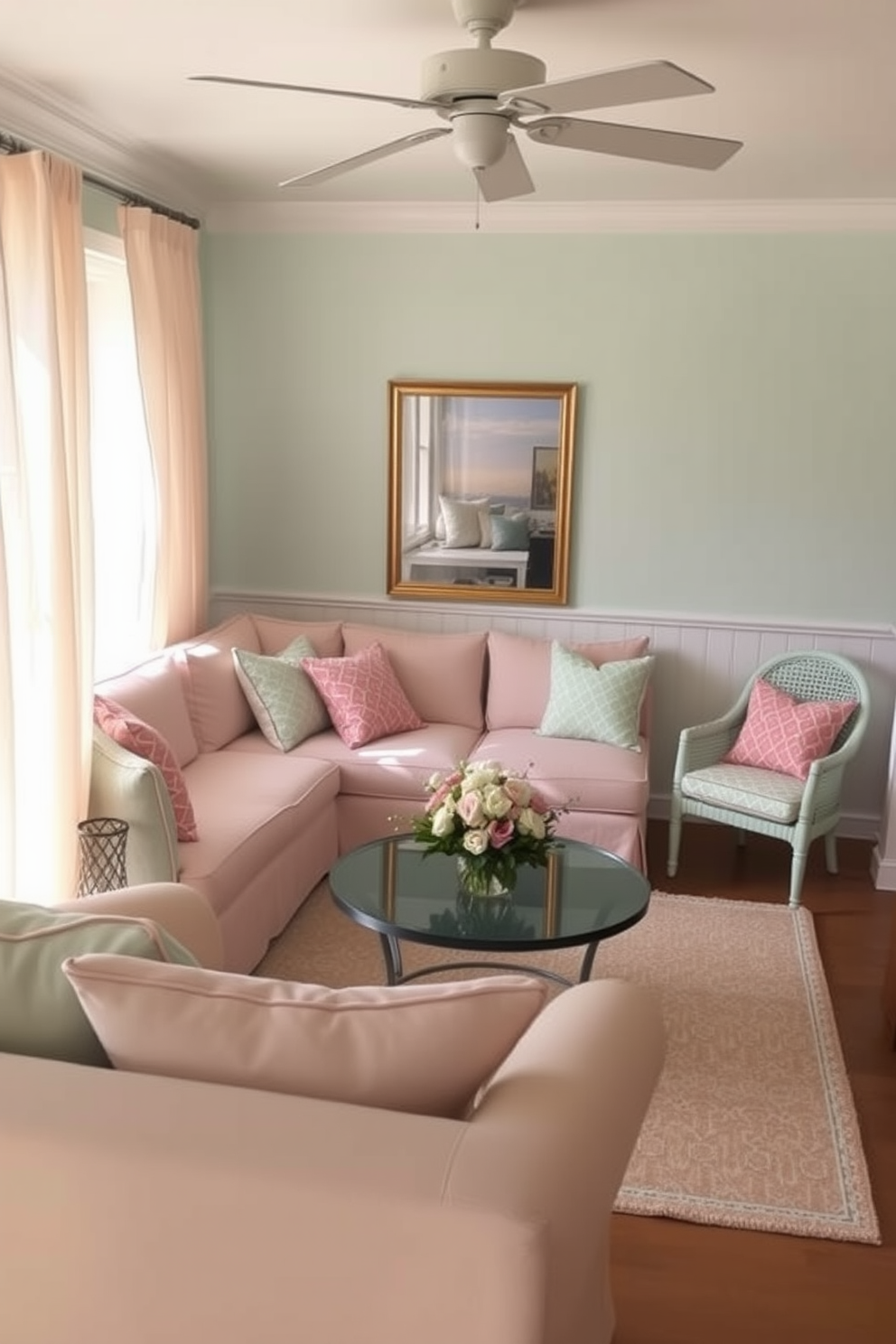 A cozy living room filled with light pastel colors. Soft pink and mint green accents adorn the furniture, creating a refreshing summer vibe. A small sectional sofa is paired with a round coffee table topped with a floral arrangement. Light curtains flutter in the breeze, allowing natural light to illuminate the space.