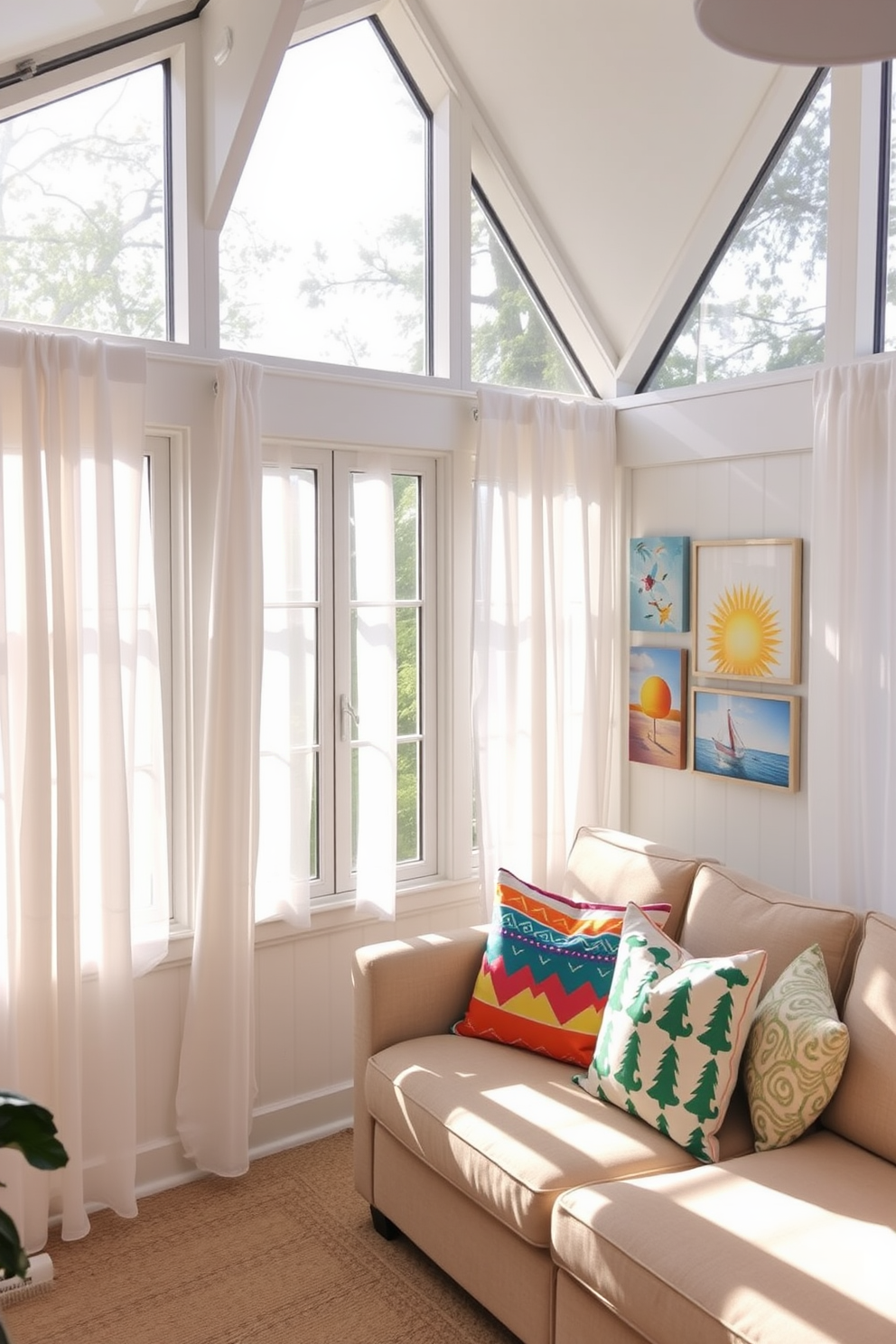 A bright and airy sunroom filled with natural light. The space features large windows draped with sheer white curtains, allowing sunlight to flood in. In one corner, a cozy seating area includes a plush sectional sofa adorned with colorful throw pillows. A gallery wall showcases vibrant summer-themed artwork, bringing a cheerful and artistic touch to the room.