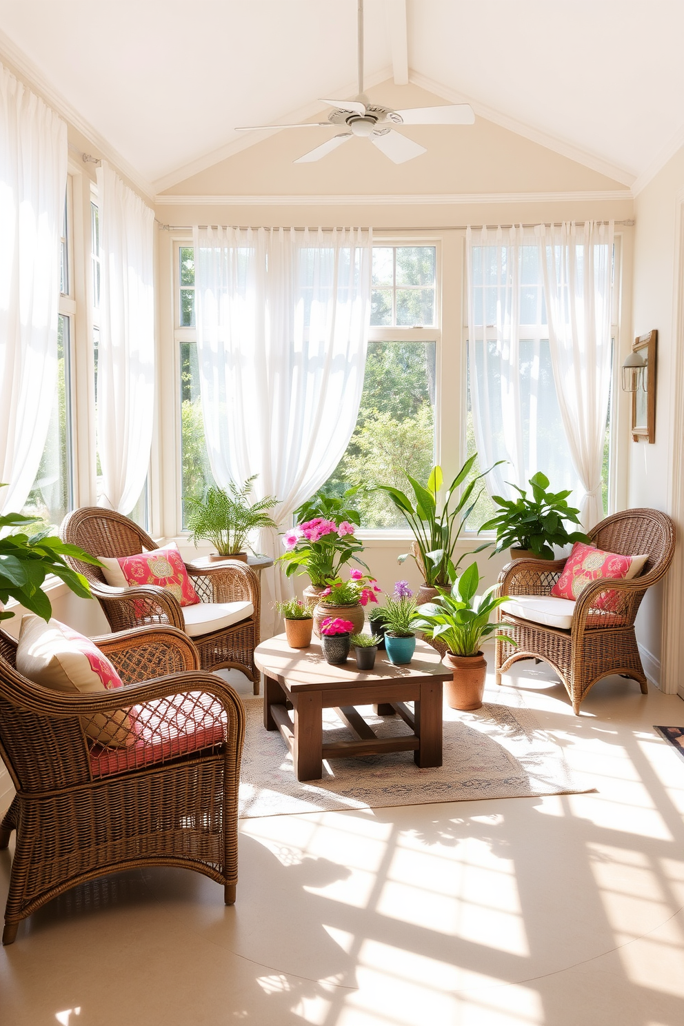 A bright and airy sunroom filled with natural light. There are comfortable wicker chairs adorned with colorful cushions, and a rustic wooden coffee table sits in the center surrounded by vibrant potted plants. The walls are painted in a soft pastel hue, creating a serene backdrop. Sheer white curtains flutter gently in the breeze, adding a touch of elegance while allowing sunlight to filter through.